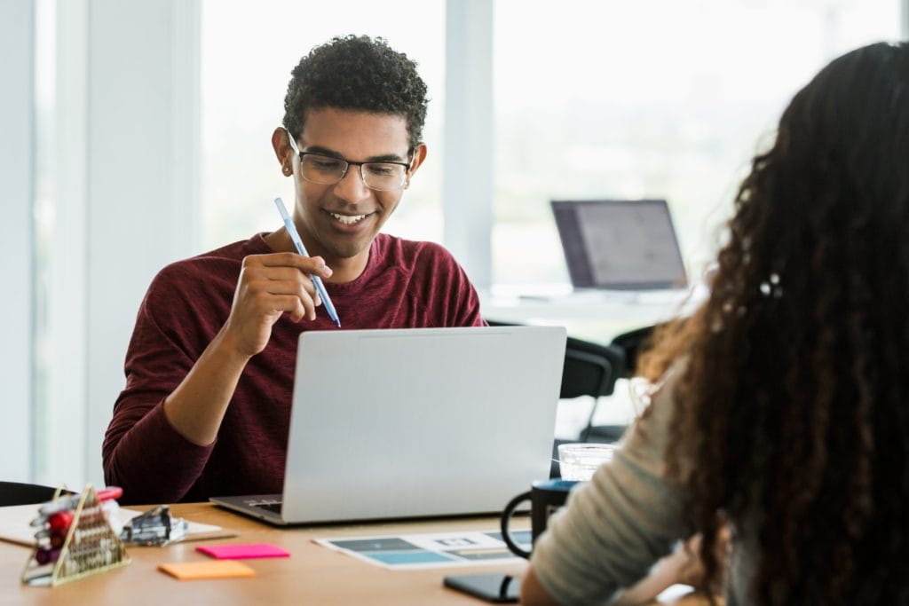 Interviewer providing positive candidate experience to job applicant