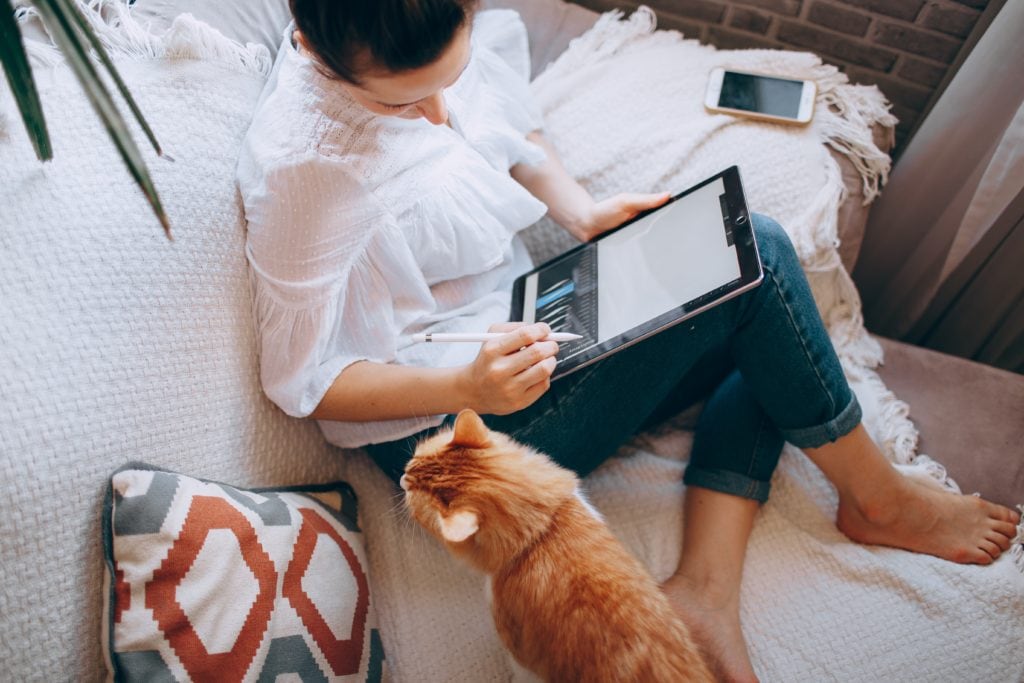 An employee at home training for remote work success