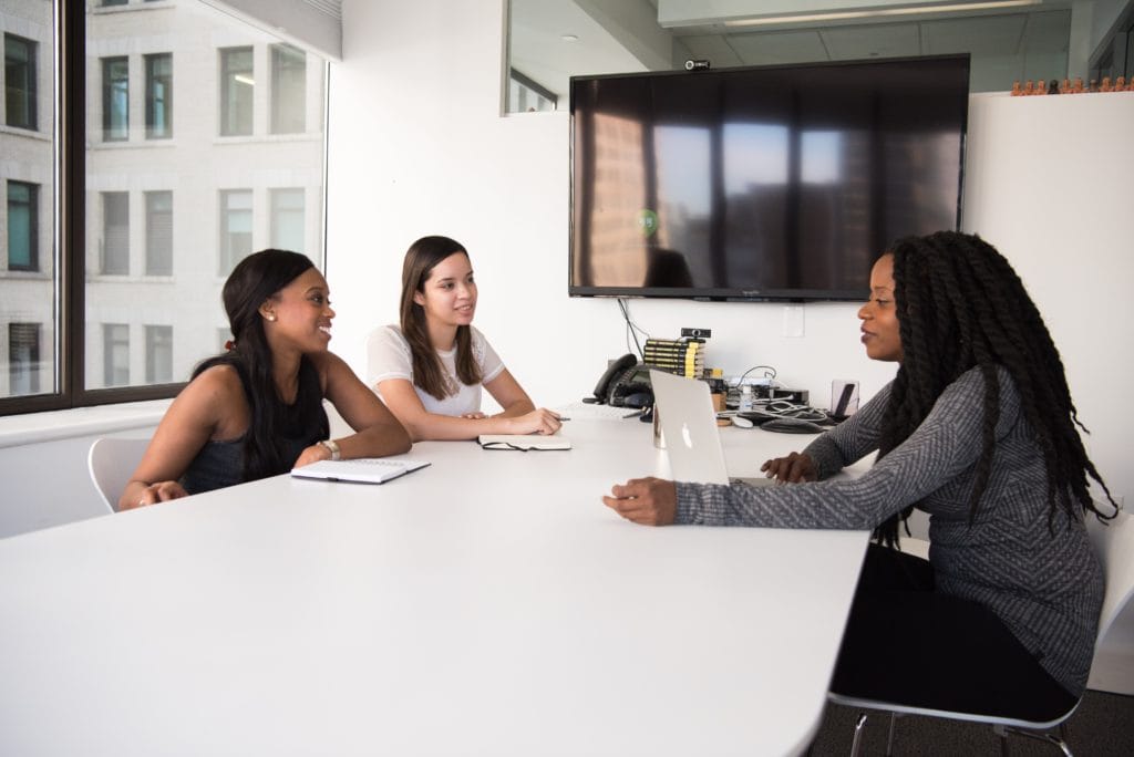 Hiring managers interviewing a candidate in high volume hiring