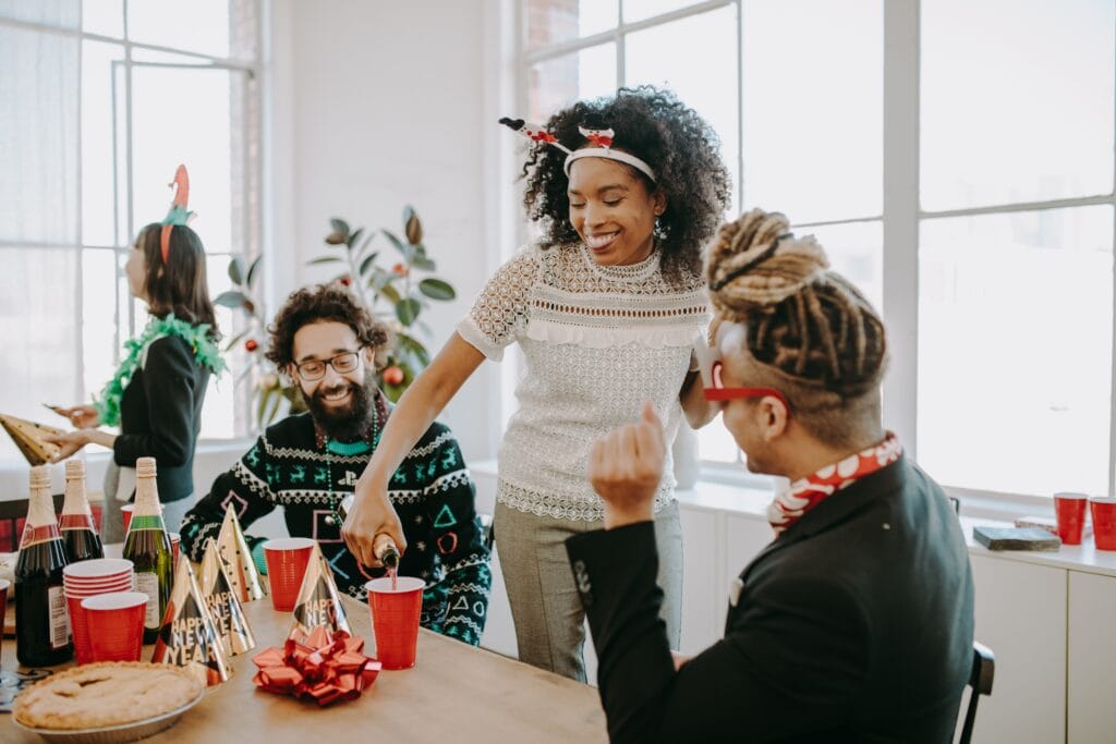 employees celebrating the holidays with co workers
