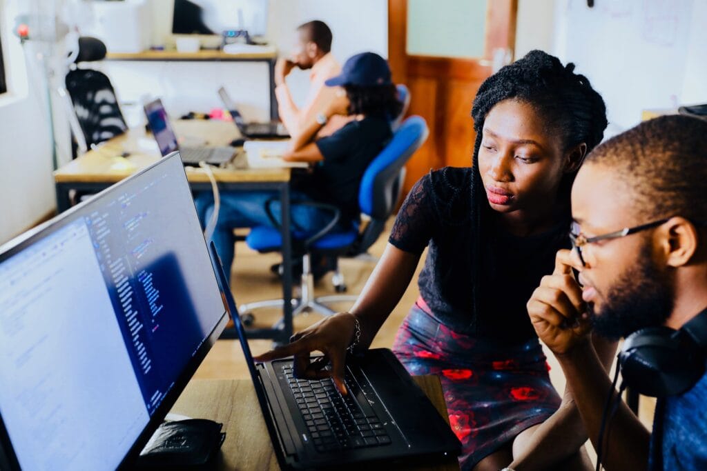 an HR professional providing reskilling and upskilling to an employee