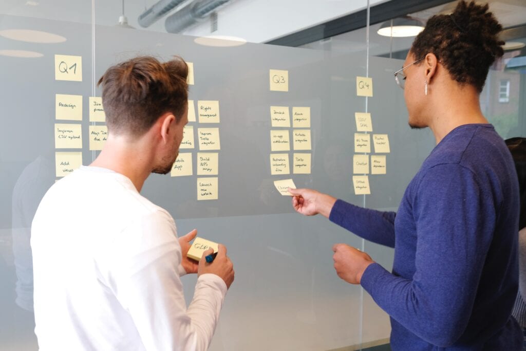 Two HR professionals developing a talent management strategy