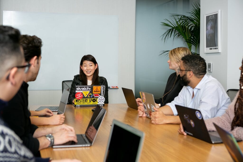 leaders deciding how to use AI in HR and AI in leadership