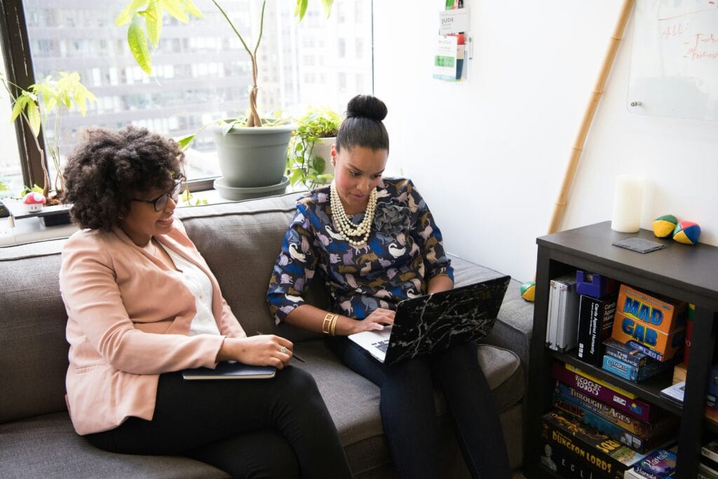 Two HR managers discuss employee retention using pre and post hire strategies.