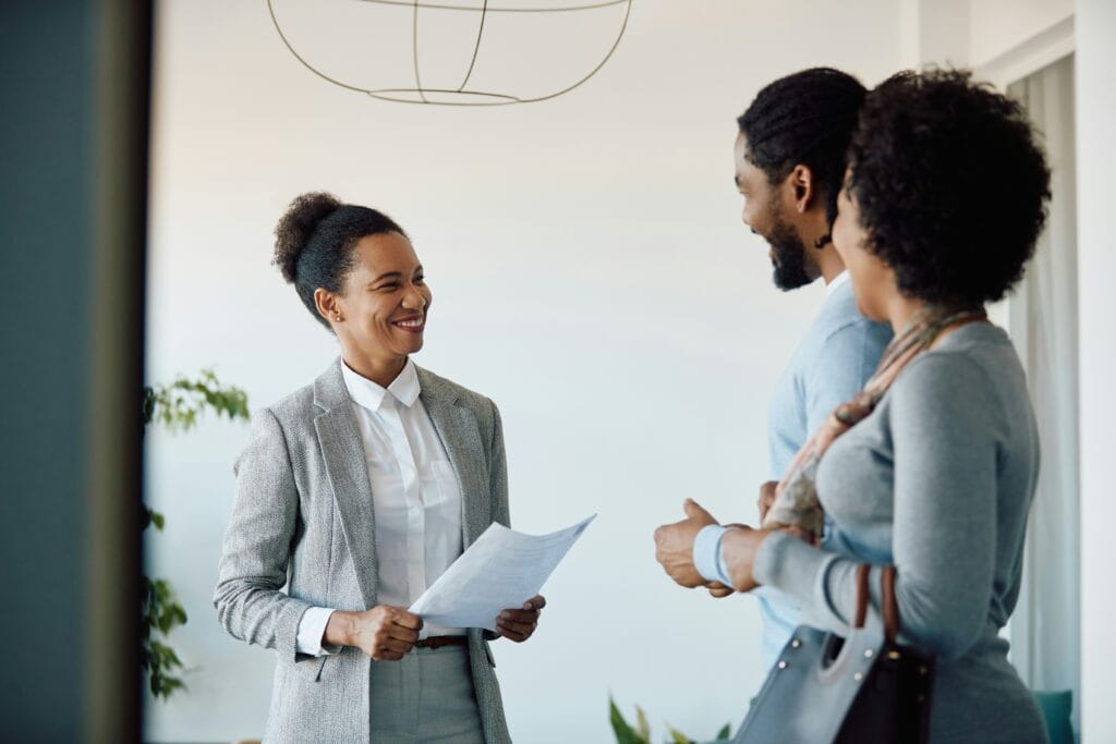 A property manager is meeting with 2 prospective tenents.